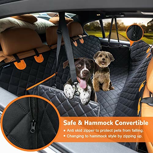 Two dogs sitting on a car seat cover with safety features.