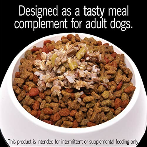 Bowl of dry dog food with wet food topping.