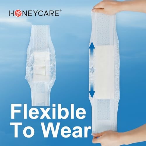 Sanitary pad showing flexibility with hands stretching it.