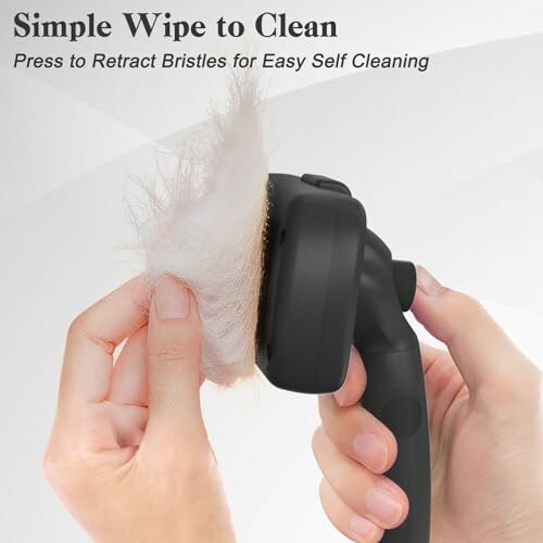 Hand using a pet brush with retractable bristles for easy cleaning.