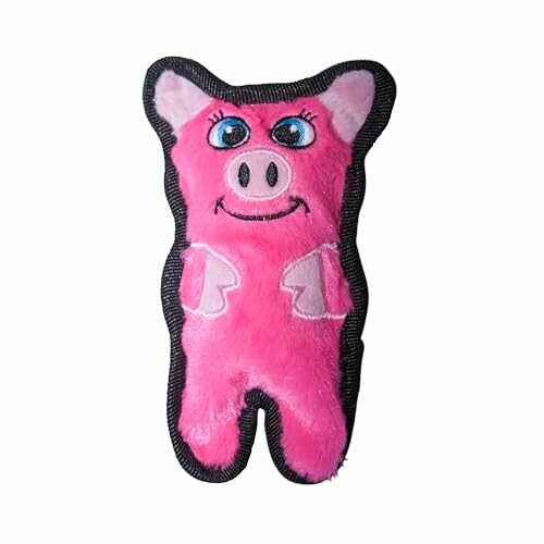 Pink plush pig toy with a smiling face