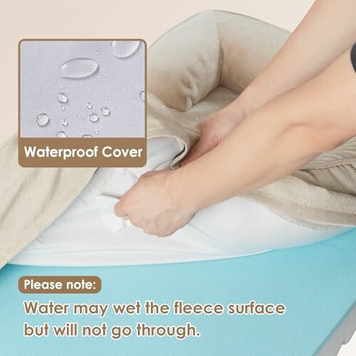 Hands lifting dog bed cover with waterproof layer underneath.